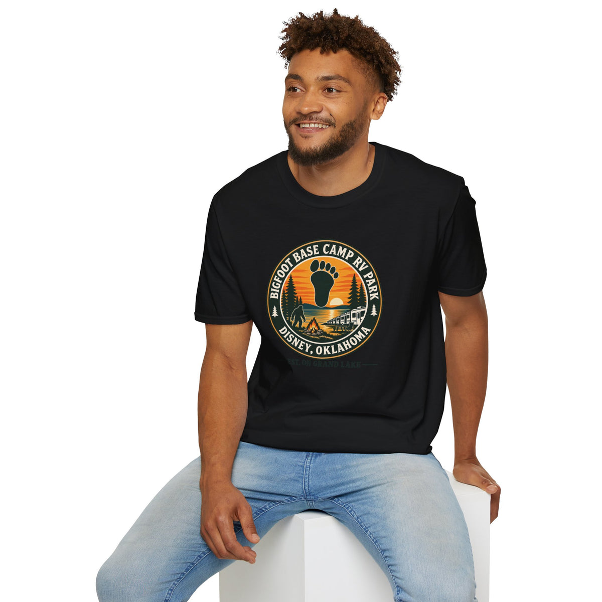 Bigfoot Base Camp RV Park T‑Shirt — Retro Camping Badge (Disney, Oklahoma)