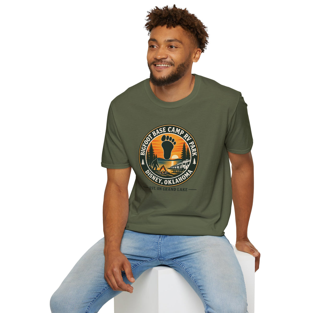 Bigfoot Base Camp RV Park T‑Shirt — Retro Camping Badge (Disney, Oklahoma)